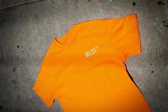 T-Shirt With Geometric Prints-MILES LOGO HIT TEE - SAFETY ORANGE